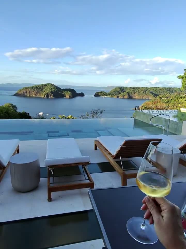 A champagne toast overlooking the Gulf of Papagayo at Nekajui, a Ritz-Carlton Reserve